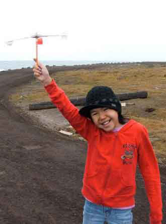 Photo: An ACMP flies her hand-made anemometer in the wind